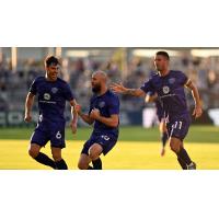 Louisville City FC celebrates after a goal