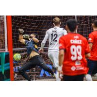 Florida Tropics forward Taylor Walter Bond beats Chihuahua Savage goalkeeper Ivan Munoz for a goal