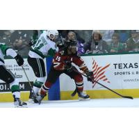 Texas Stars' Riley Barber battles Tucson Roadrunners' Bokondji Imama