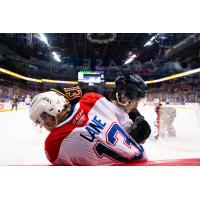 Vancouver Giants' Damian Palmieri battles Spokane Chiefs' Grady Lane