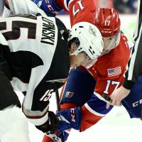 Vancouver Giants' Jaden Lipinski versus Spokane Chiefs' Carter Streek