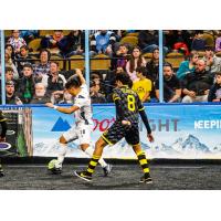 Ben-Avir Espinal of the Florida Tropics and Luan Oliveria of the Milwaukee Wave battle for a loose ball