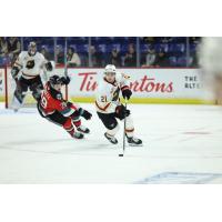 Vancouver Giants' Dylan Anderson versus Kelowna Rockets' Logan Peskett