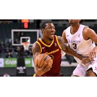 Gabe Osabuohien of the Cleveland Charge drives against the Delaware Blue Coats