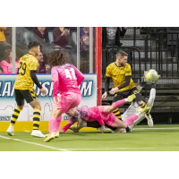 St. Louis Ambush's Brian Bement and Milwaukee Wave's and Slavador Nunez and Andrew Wiedabach on the field