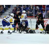 Saskatoon Blades' Conner Roulette battles the Vancouver Giants