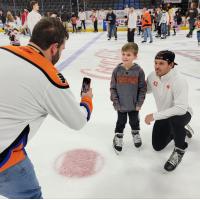 Lehigh Valley Phantoms' Hayden Hodgson poses with a fan