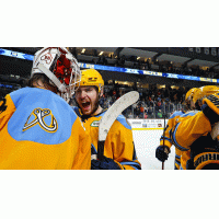 Toledo Walleye react after a win