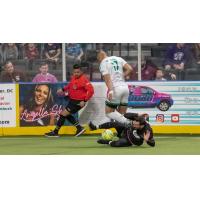 St. Louis Ambush move in for the tackle against the Dallas Sidekicks