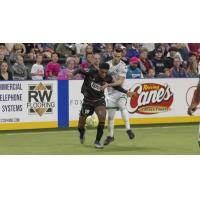 St. Louis Ambush defender Wil Nyamsi (left) vs. the Dallas Sidekicks