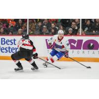 Belleville Senators defenceman Jacob Bernard-Docker (left) vs. the Laval Rocket