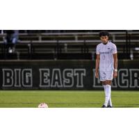 Midfielder Armaan Wilson with Providence College