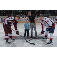 Peterborough Petes' Shawn Spearing and Windsor Spitfires' Matthew Maggio with Petes' Mental Health Coach Jack Veitch and his son Bear