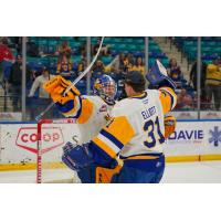 Saskatoon Blades' Austin Elliott and Ethan Chadwick celebrate win