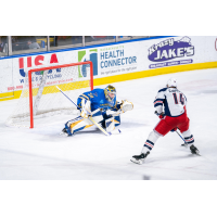 Springfield Thunderbirds' Joel Hofer versus Hartford Wolf Pack's Ryan Carpenter