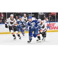 Lehigh Valley Phantoms' Kevin Connauton and Syracuse Crunch's Lucas Edmonds in action