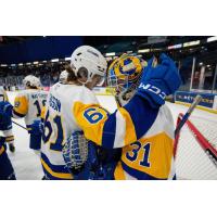 Saskatoon Blades' Jake Chiasson and Austin Elliott celebrate win