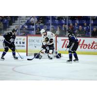 Vancouver Giants' Ty Thorpe versus Victoria Royals' Austin Zemlak and Brayden Schuurman