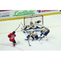 Saskatoon Blades goaltender Austin Elliot stretches to make a save against the Regina Pats