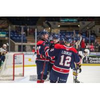 Saginaw Spirit's Dean Loukus and Matyas Sapovaliv celebrate win