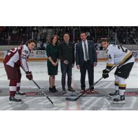 Peterborough Petes' Tucker Robertson and Kingston Frontenacs' Thomas Budnick with Allison Verner, Dr. Vincent Cheun and Petes' Associate Coach Andrew Verner