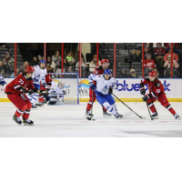 Wichita Thunder's Peter Bates battles Rapid City Rush's Jason Horvath, Keegan Iverson and Zach Court