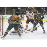 Wheeling Nailers' Cameron Hausinger and Fort Wayne Komets' Marcus McIvor on the ice