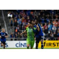 Seattle Sounders FC's Alex Roldan battles FC Cincinnati's Yerson Mosquera