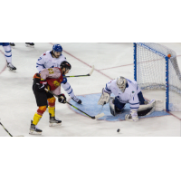 Rapid City Rush's Brett Gravelle battles Wichita Thunder's Roman Basran