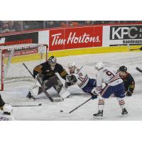 Vancouver Giants' Jesper Vikman battles Kamloops Blazers' Caedan Bankier