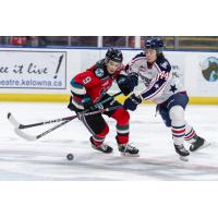 Kelowna Rockets' Marcus Pacheco battles Tri-City Americans' Chase Friedt-Mohr