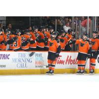 Lehigh Valley Phantoms forward Cooper Marody gives high fives along the bench