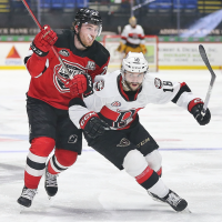 Belleville Senators right wing Jarid Lukosevicius (right)