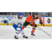 Wichita Thunder forward Quinn Preston (left) vs. the Kansas City Mavericks