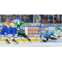 Wichita Thunder's Connor Walters, Dillon Boucher and Roman Basran battle Kansas City Mavericks' Mathieu Foget