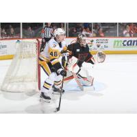 Wilkes-Barre/Scranton Penguins' Valtteri Puustinen battles Lehigh Valley Phantoms' Samuel Ersson