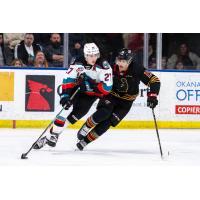 Kelowna Rockets defenceman Jackson DeSouza (left) vs. the Vancouver Giants