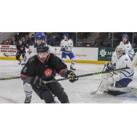 Wichita Thunder defend against the Iowa Heartlanders