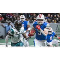 Northern Arizona Wranglers running back Jarrod Ware Jr. picks up yardage vs. the Duke City Gladiators