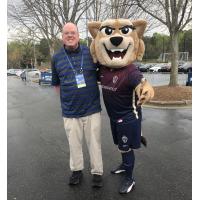 Writer Fran Stuchbury and North Carolina Courage mascot Roary