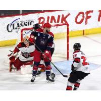 Allen Americans center Colton Hargrove sets up in front of the Rapid City Rush net