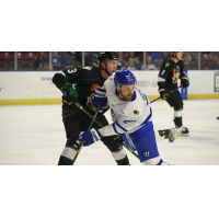 Wichita Thunder forward Dillon Boucher (right) battles for position