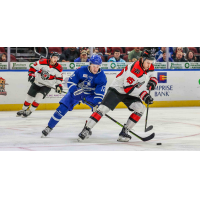 Wichita Thunder's Peter Bates and Rapid City Rush's Colton Leiter in action