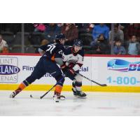 Flint Firebirds ' Matthew Jenken versus Saginaw Spirit's Sebastien Gervais