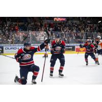 Saginaw Spirit's Matyas Sapovaliv and Michael Misa celebrate win