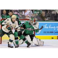 Iowa Wild's Mitchell Balmas and Texas Stars' Remi Poirier in action