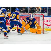 Saskatoon Blades' Justin Lies and Ethan Chadwick in action