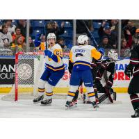 Saskatoon Blades right wing Jake Chiasson and left wing Brandon Lisowsky vs. the Red Deer Rebels