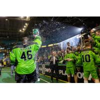 Saskatchewan Rush goaltender Laine Hruska celebrates with the crowd