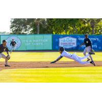 Chandler Simpson of the Charleston RiverDogs slides into second